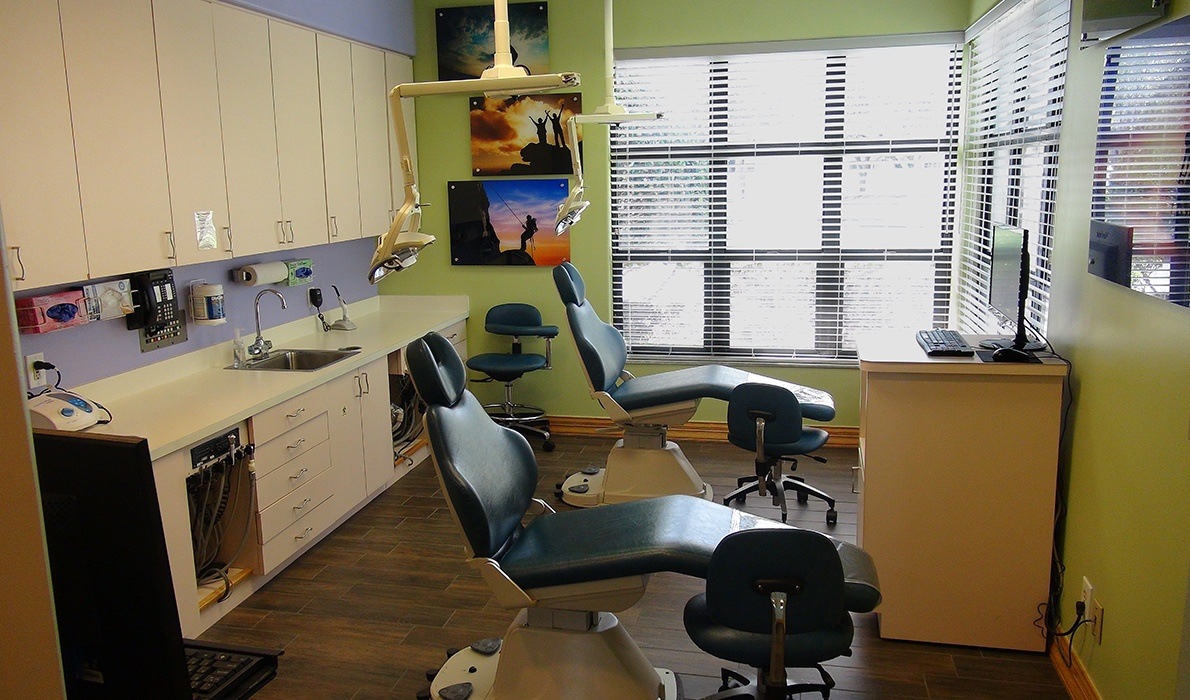 Two dental chairs in the same room