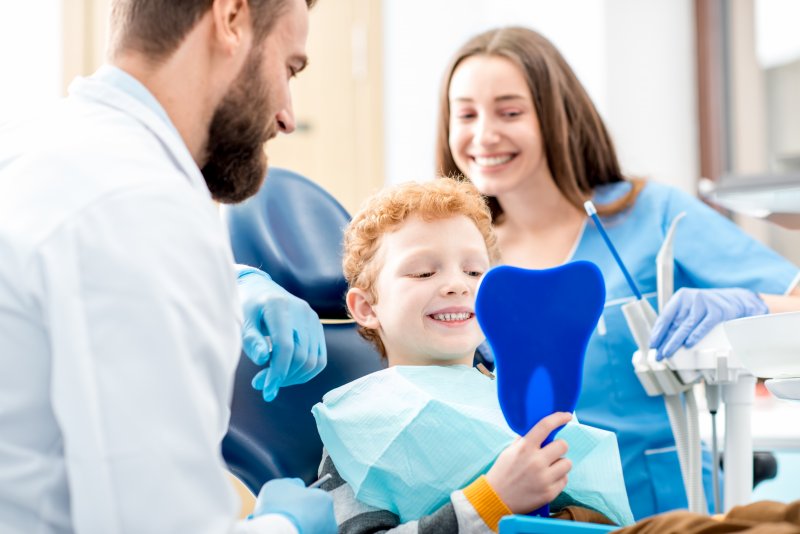 a young boy visiting the pediatric dentist