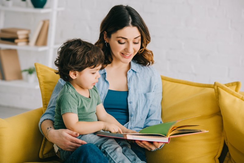 mother reading to her toddler